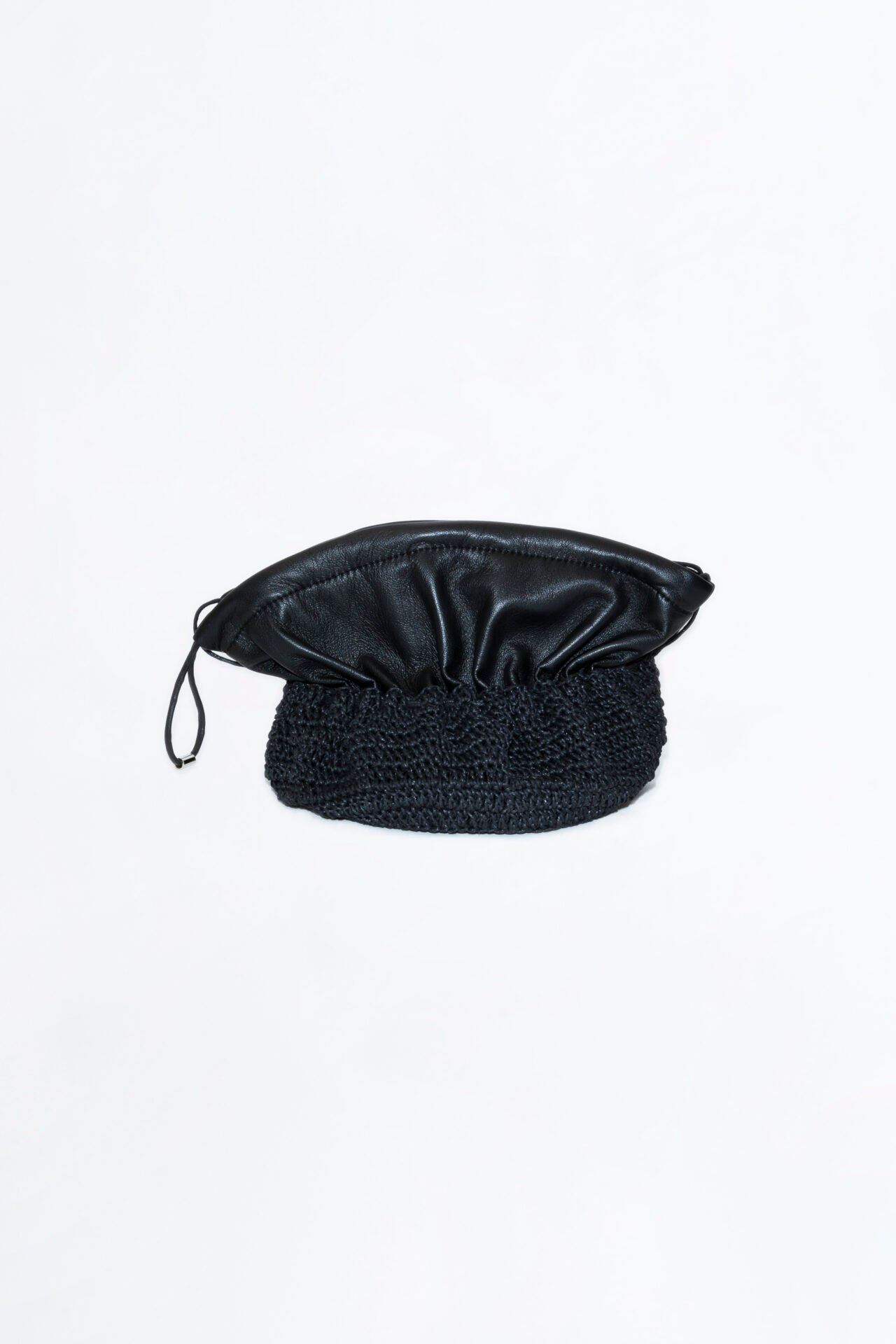 Carterita Pared tejida a mano con hilo de algodón encerado y fuelle de cuero de oveja.